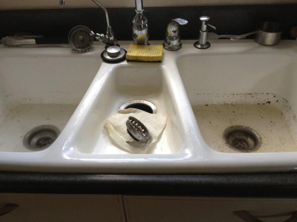 Clogged Plugged Residential Kitchen Sink 